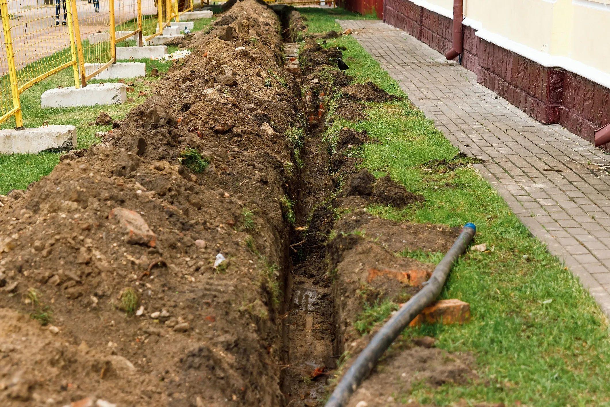 Excavation alongside a building foundation